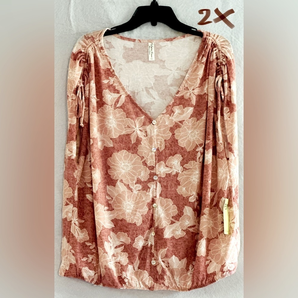 LADIES DARK CORAL COLORED TOP WITH WHITE FLOWERS